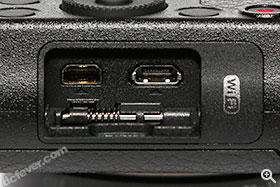 AV OUT / DIGITAL 以及 HDMI 插口。旁邊 Wi-Fi 標誌表明 GM1 具備內置 Wi-Fi。