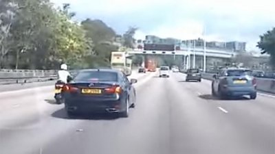 【有片】私家車司機罔顧安全　追尾鐵騎意外險生